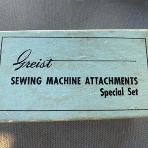 Greist sewing machine attachments.